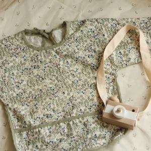 Avery Row Sleeved Bib - Riverbank