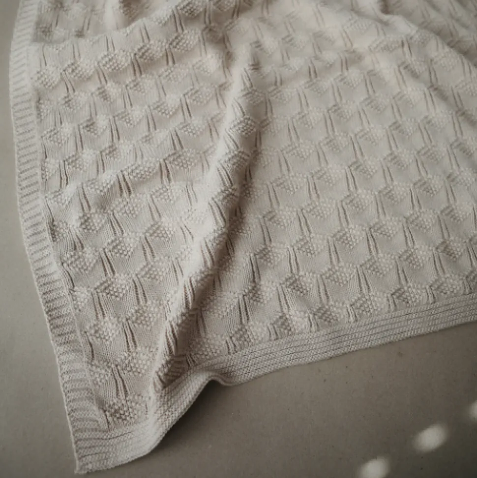 mushie_knitted_honeycomb__1-1.webp Mushie Knitted Honeycomb Baby Blanket - Beige