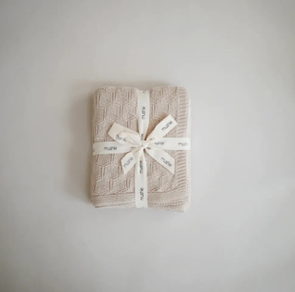mushie_knitted_honeycomb__3-1.webp Mushie Knitted Honeycomb Baby Blanket - Beige
