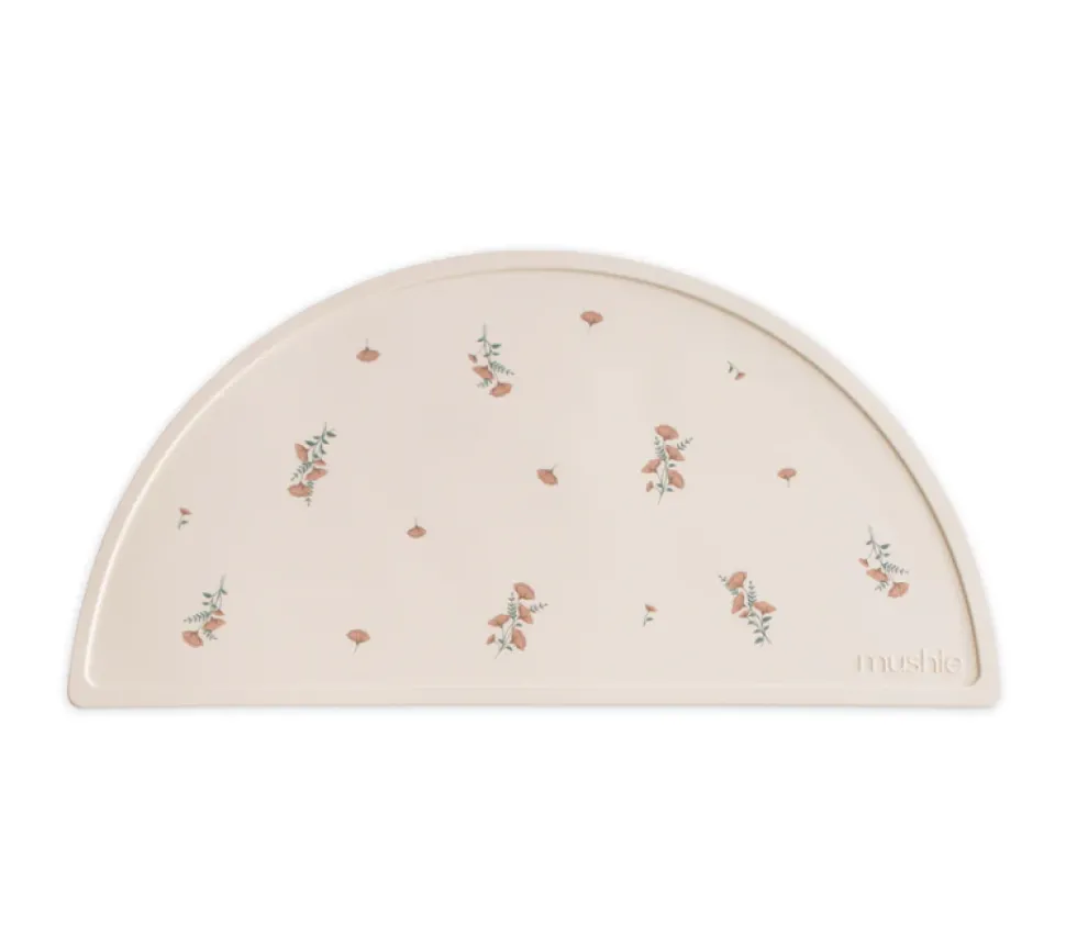 mushie_place_mat__pink_fl_0.webp Mushie Place Mat - Pink Flowers