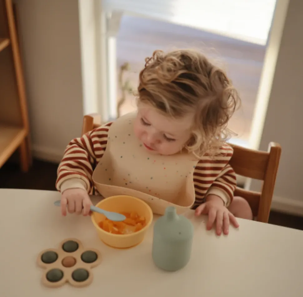 mushie_silicone_bib__vani_1.webp Mushie Silicone Bib - Vanilla Confetti